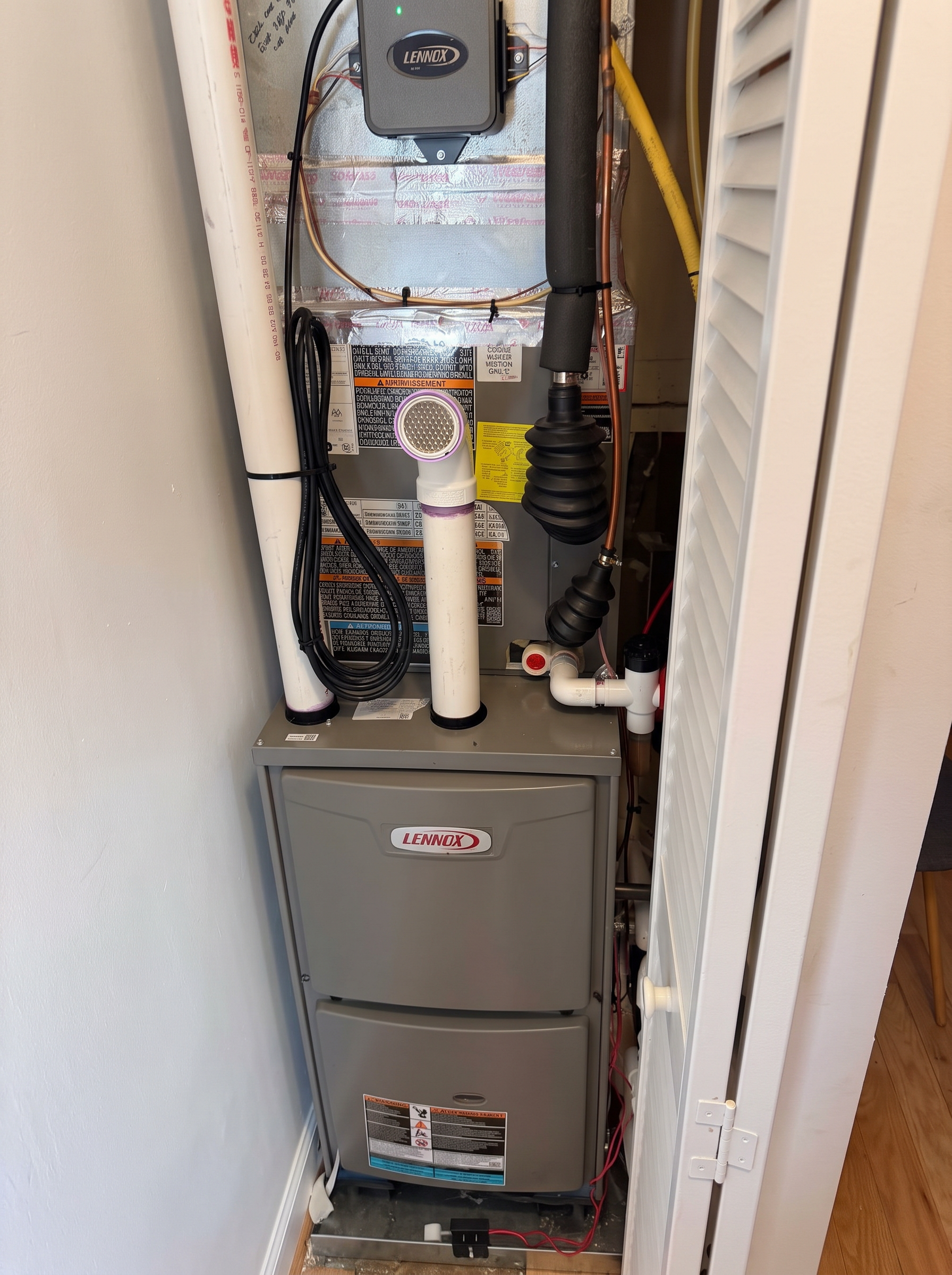 New Lennox gas furnace in its upstairs closet at 749 Kenyon Street NW